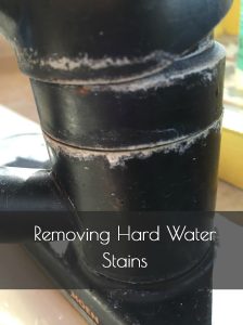Hard Water Stains on Black Faucet